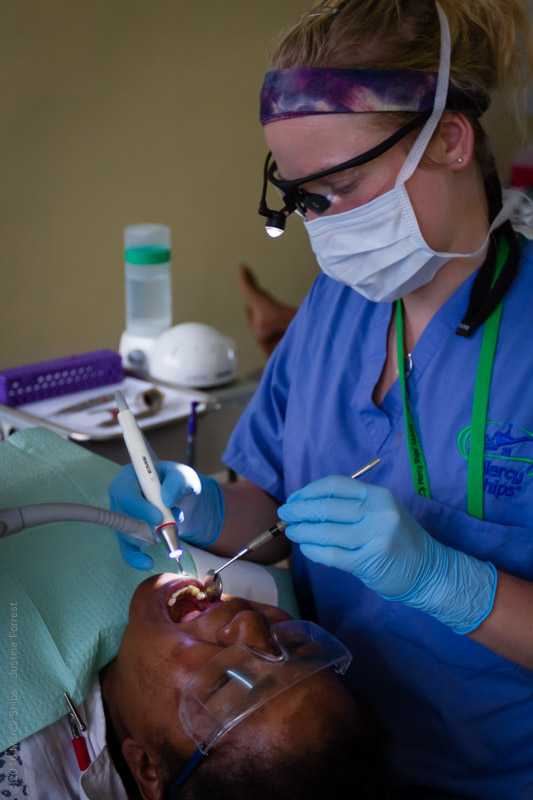 ©2016 Mercy Ships Photo Credit Justine Forrest; COM138 Heidi van Eijl (NLD) Dental Hygienist with dental equipment from EMS